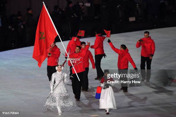 Flag bearer Samir Azzimani of Morocco leads his country during the Opening Ceremony of the PyeongChang 2018 Winter Olympic Games at PyeongChang...