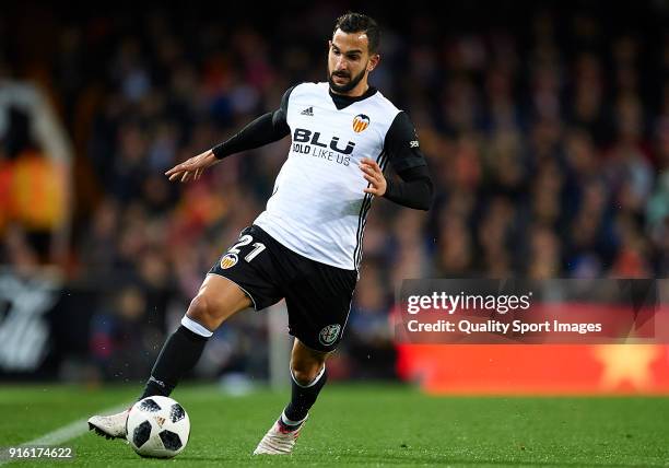 Martin Montoya of Valencia runs with the ball during the Copa del Rey semi-final second leg match between Valencia and Barcelona at Mestalla Stadium...