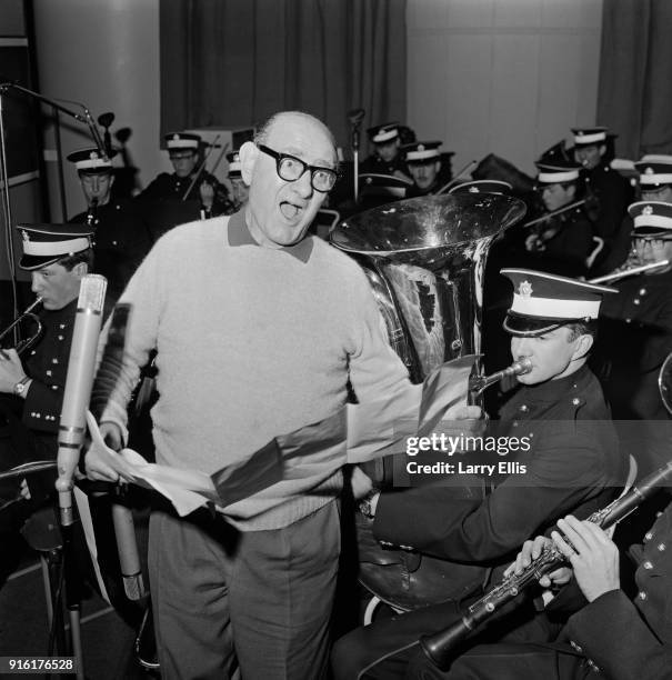 British actor and entertainer Bud Flanagan recording theme song for the British sitcom Dad's Army, 'Who Do You Think You Are Kidding, Mr Hitler?',...