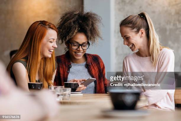 girlfriends hanging out - group of friends of the syrian people stock pictures, royalty-free photos & images