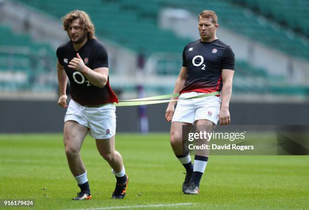 Dylan Hartley the England captain warms up with Alec Hepburn during the England captain's run held at Twickenham Stadium on February 9, 2018 in...