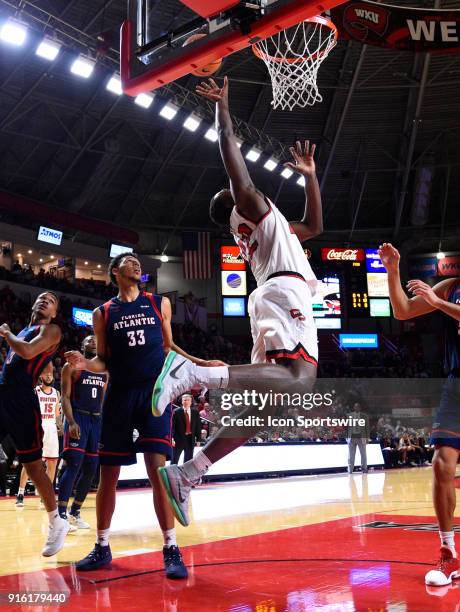 Florida Atlantic Owls center Ronald Delph fouls Western Kentucky Hilltoppers forward Dwight Colby during the second half of the Florida Atlantic Owls...
