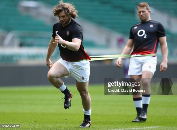 Dylan Hartley the England captain warms up with Alec Hepburn during the England captain's run held at Twickenham Stadium on February 9, 2018 in...