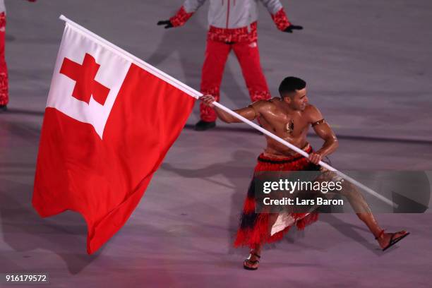 Flag bearer Pita Taufatofua of Tonga leads the team during the Opening Ceremony of the PyeongChang 2018 Winter Olympic Games at PyeongChang Olympic...