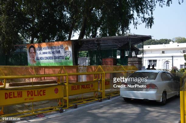 An exterior view of the All India Congress Committee office situated along Akbar Road in New Delhi. Victims and their family members gather along...