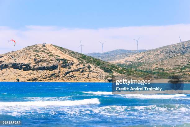 waves at the shore of mediterranean sea viewed from prasonisi beach, rhodes, greece - kite lagoon stock pictures, royalty-free photos & images