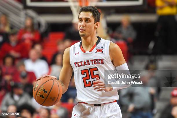 Davide Moretti of the Texas Tech Red Raiders brings the ball up court during the game against the Iowa State Cyclones on February 7, 2018 at United...