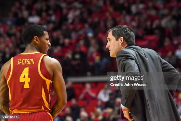 Head coach Steve Prohm of the Iowa State Cyclones talks with Donovan Jackson of the Iowa State Cyclones during the game against Texas Tech Red Riders...