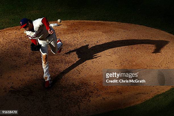 Starting pitcher Cole Hamels of the Philadelphia Phillies throws a pitch against the Colorado Rockies in Game Two of the NLDS during the 2009 MLB...