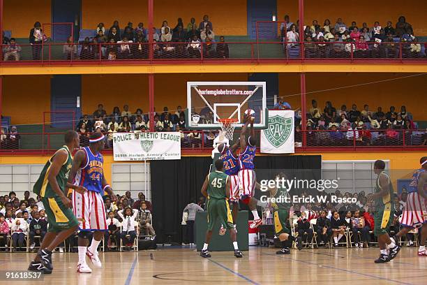 Harlem Globetrotters Special K Daley and Bear Butler in action, dunk vs Washington Generals at 369th Harlem Armory. New York, NY 10/5/2009 CREDIT:...