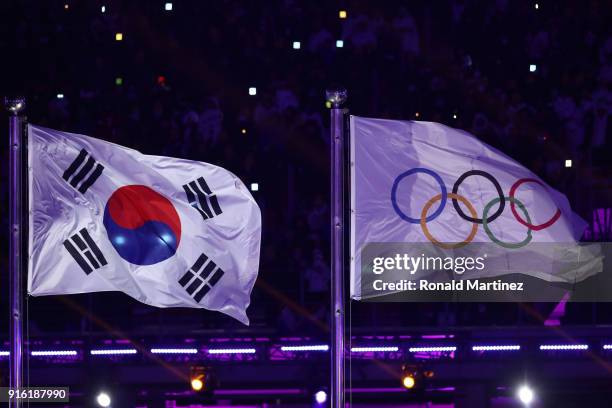 The Flag of South Korea and the Olympic Flag are seen during the Opening Ceremony of the PyeongChang 2018 Winter Olympic Games at PyeongChang Olympic...