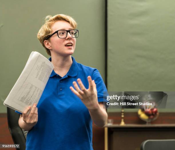 teenage girl gesturing and holding script - acting stock pictures, royalty-free photos & images