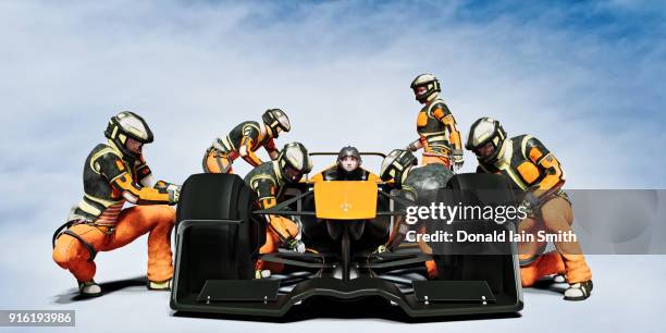 futuristic pit crew servicing race car - pit crew challenge imagens e fotografias de stock