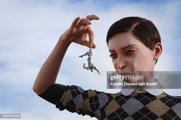 giant woman holding robot upside-down by leg - giantess stock pictures, royalty-free photos & images