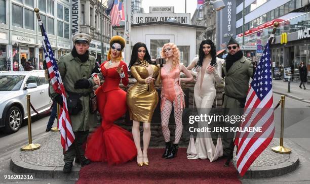 Dancers from the Friedrichstadt Palast revue, who portray celebrities such as Divine, Kim Kardashian, Madonna and Conchita Wurst pose with performing...