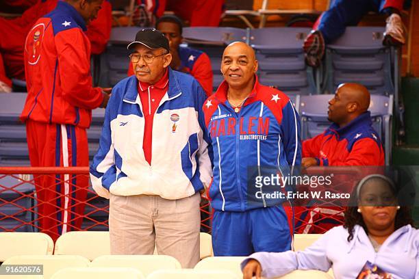 Harlem Globetrotters legends Tex Harrison and Curly Neal in stands before game vs Washington Generals at 369th Harlem Armory. New York, NY 10/5/2009...