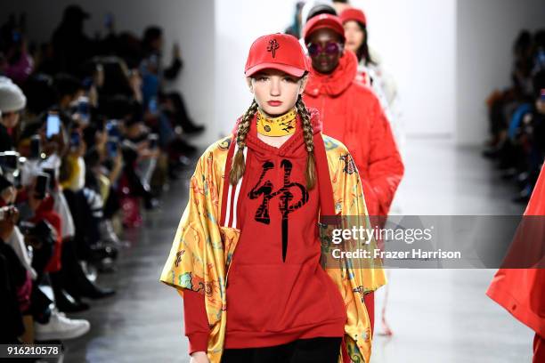 Models walk the runway for Just In XX fashion show during New York Fashion Week: The Shows at Gallery II at Spring Studios on February 9, 2018 in New...
