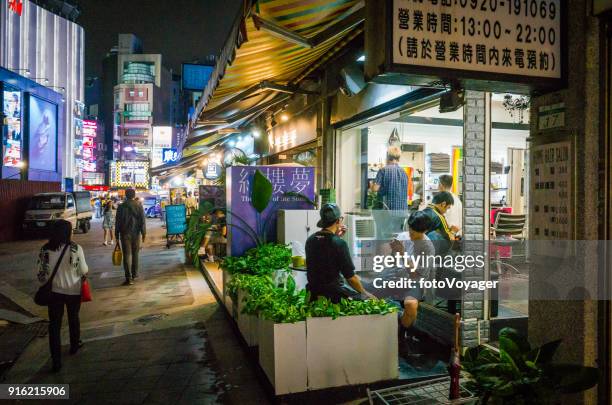 taipei barbers shop ximen gay village illuminated at night taiwan - busy barber shop stock pictures, royalty-free photos & images