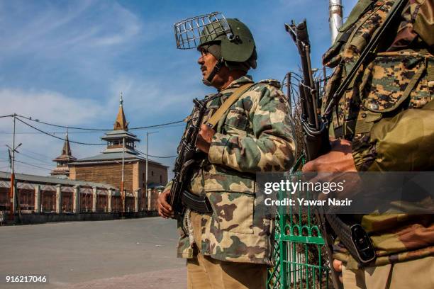 Indian paramilitary troopers stands guard, in front Kashmir's Jamia Masjid in the Old City during restrictions on the fifth death anniversary of...