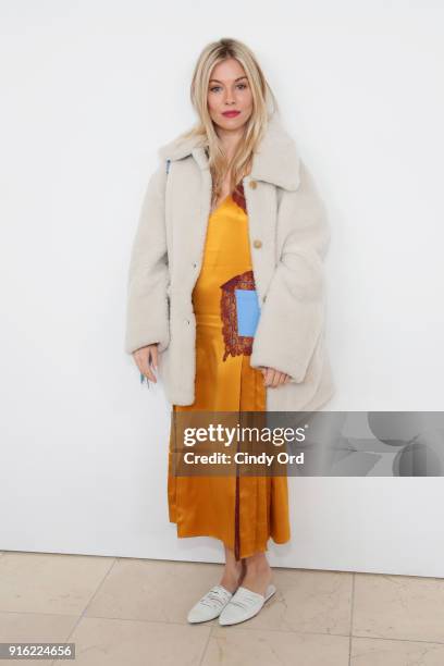 Actor Sienna Miller attends the Tory Burch Fall Winter 2018 Fashion Show during New York Fashion Week at Bridge Market on February 9, 2018 in New...