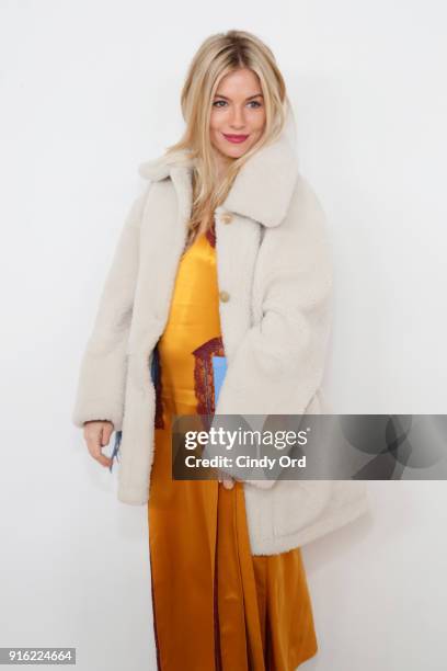 Actor Sienna Miller attends the Tory Burch Fall Winter 2018 Fashion Show during New York Fashion Week at Bridge Market on February 9, 2018 in New...