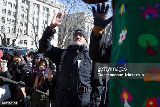 New Sanctuary movement activist Ravi Ragbir joins a weekly protest march against immigrant deportations on February 8, 2018 outside of immigration...