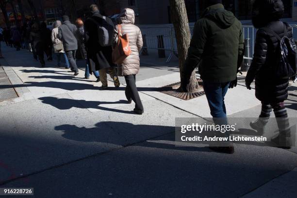 New Sanctuary movement activists march in a weekly protest against immigrant deportations on February 8, 2018 outside of immigration court at 26...