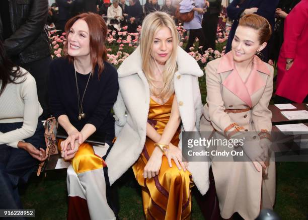 Julianne Moore, Sienna Miller, and Zoey Deutch attend the Tory Burch Fall Winter 2018 Fashion Show during New York Fashion Week at Bridge Market on...