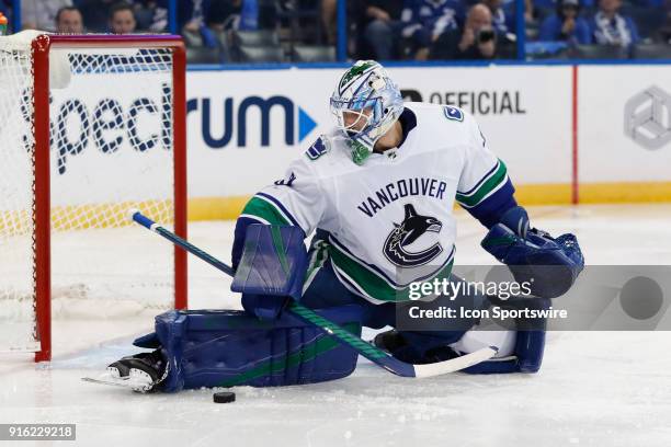 Vancouver Canucks goaltender Anders Nilsson makes a save in the second period of the NHL game between the Vancouver Canucks and Tampa Bay Lightning...