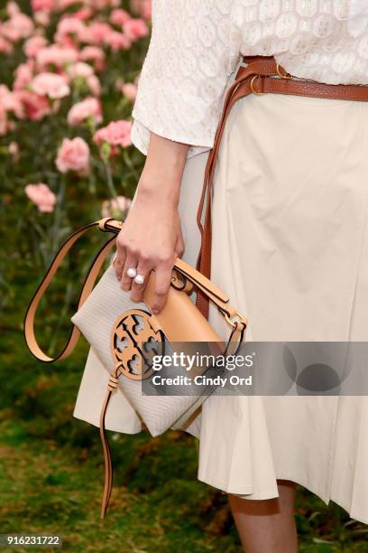 Singer and actor Ella Chen, bag detail, attends the Tory Burch Fall Winter 2018 Fashion Show during New York Fashion Week at Bridge Market on...