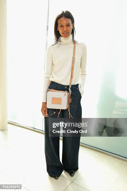 Model Liya Kebede attends the Tory Burch Fall Winter 2018 Fashion Show during New York Fashion Week at Bridge Market on February 9, 2018 in New York...