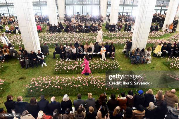 Models walk the runway during the Tory Burch Fall Winter 2018 Fashion Show during New York Fashion Week at Bridge Market on February 9, 2018 in New...