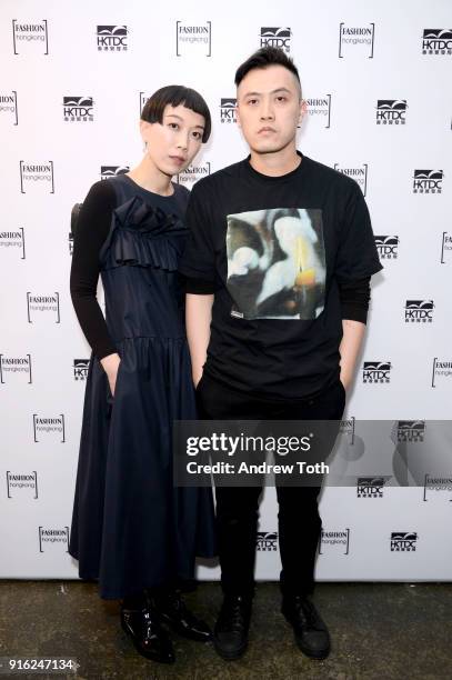 Designers Yi Chan and Lary Cheung of Heaven Please pose backstage for Fashion Hong Kong during New York Fashion Week: The Shows at Industria Studios...