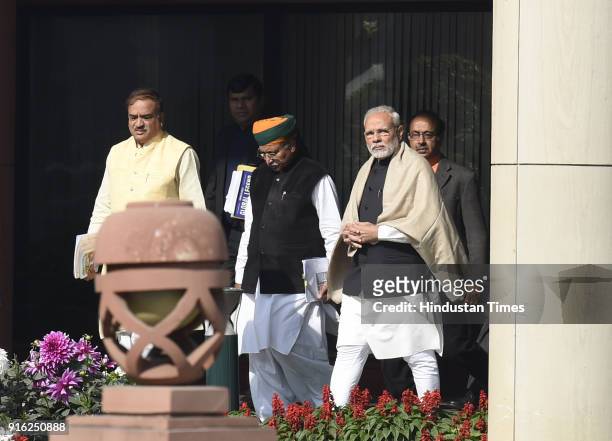 Prime Minister Narendra Modi with Union Minister Ananth Kumar after the BJP parliamentary party meeting, during the Budget session of Parliament on...