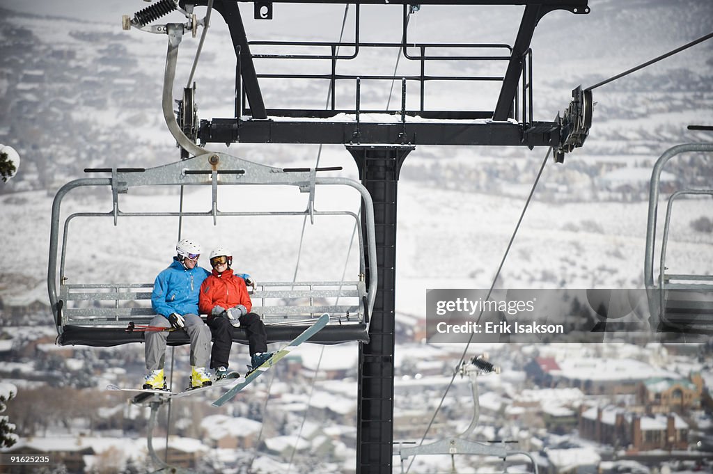 Skiers on a ski lift