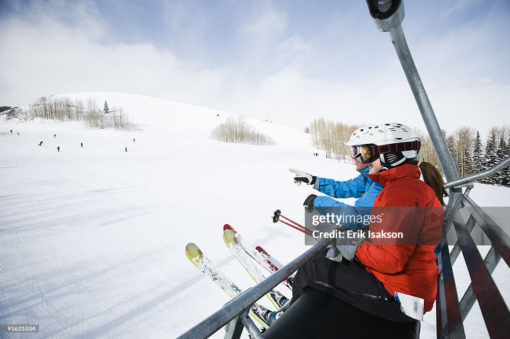 Skiers on a ski lift