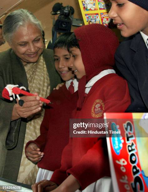 Sheila Dikshit, Chief Minister of Delhi with school children during the launch of Chalta Firta School Van , in New Delhi. The vans have been...