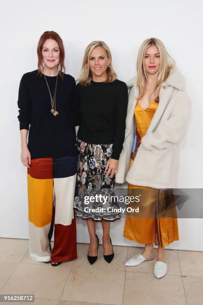 Julianne Moore, Tory Burch, and Sienna Miller attend the Tory Burch Fall Winter 2018 Fashion Show during New York Fashion Week at Bridge Market on...