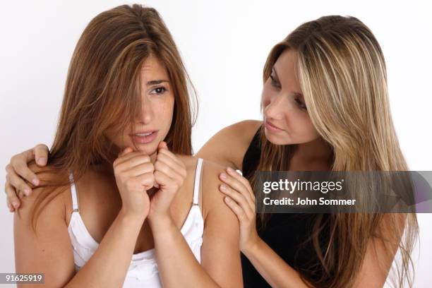 girl consoling her friend - two people white background stock pictures, royalty-free photos & images