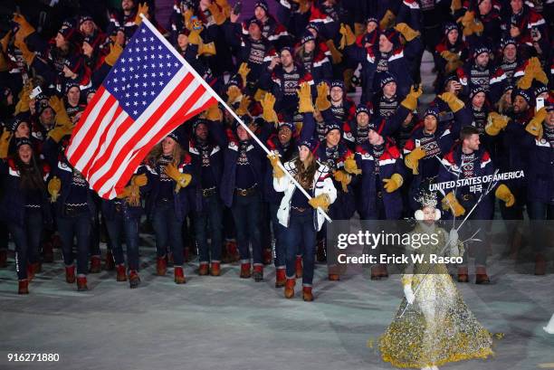 Winter Olympics: Four-time Olympian luger and Team USA flag bearer Erin Hamlin leads the delegation during Parade of Nations at PyeongChang Olympic...