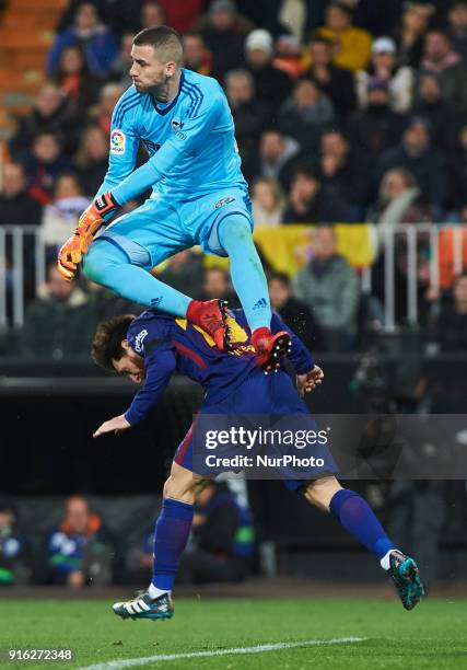 Jaume Domenech of Valencia CF and Leo Messi of FC Barcelona during the spanish Copa del Rey semi-final, second leg match between Valencia CF and FC...