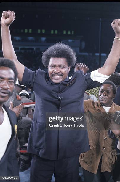 Heavyweight Title: Promotor Don King victorious at 20th of May Stadium. Kinshasa, Zaire CREDIT: Tony Triolo