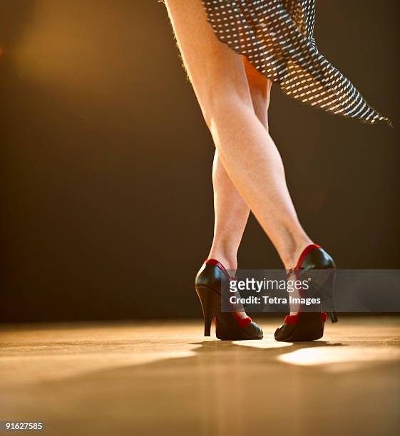 a woman dancing - bailando salsa fotografías e imágenes de stock
