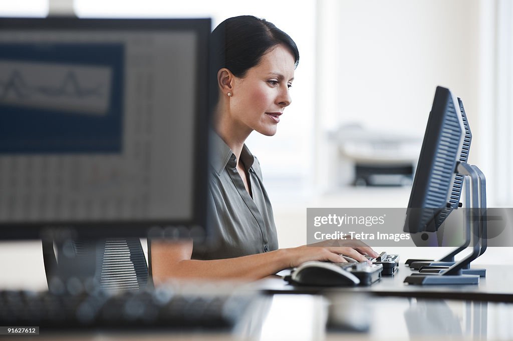 A businesswoman using a computer