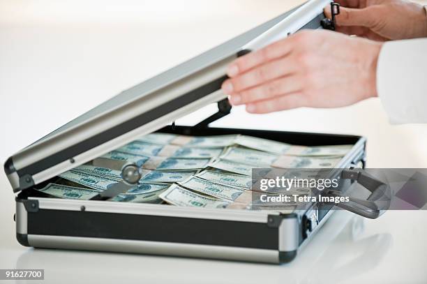 Briefcase Hand Off 125 Closing Briefcase Stock Photos, High-Res Pictures, and Images ...