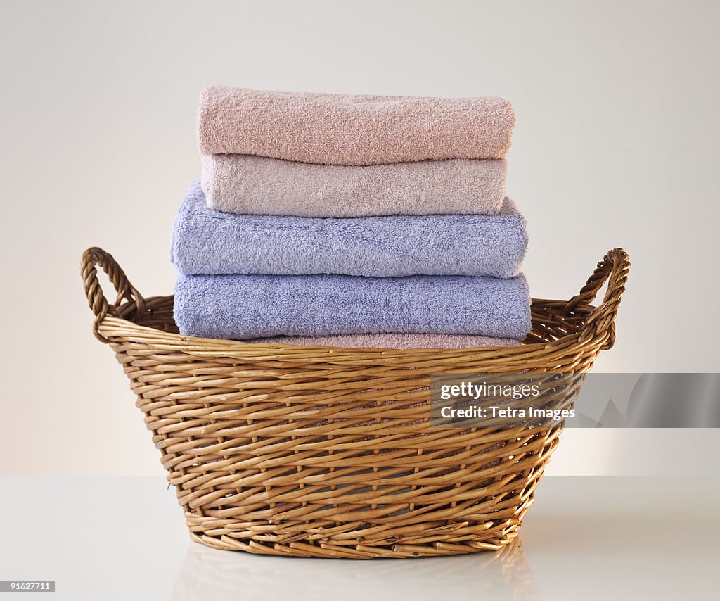 A laundry basket full of towels
