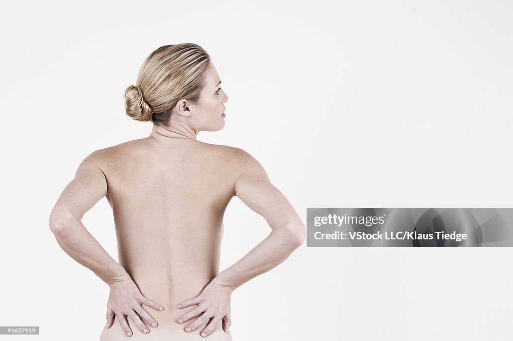 A woman with back pain