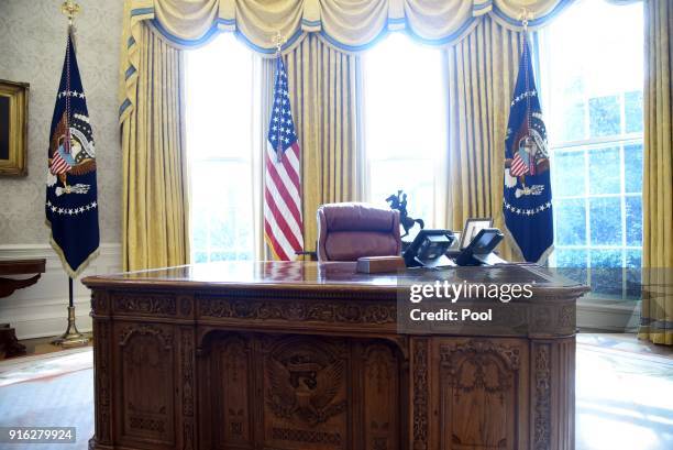 The Resolute desk is seen in the Oval Office of the White House, February 9, 2018 in Washington, DC. President Donald Trump gave a $10,000 check to...