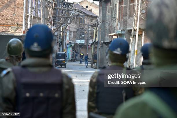 Kashmiri protester throws stones towards Indian government forces during a protest in Srinagar, Indian administered Kashmir. Indian forces fired...