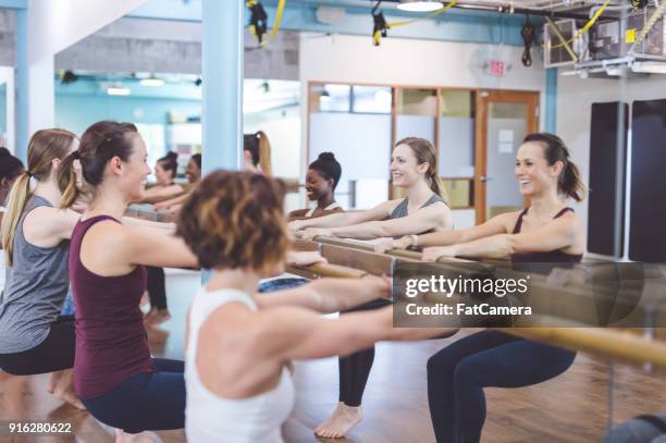 women doing barre workout together - hesitant to dance stock pictures, royalty-free photos & images